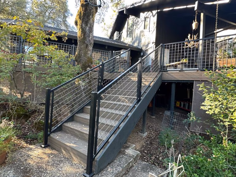 A modern house with a well-maintained exterior, showcasing the quality of residential construction services offered by Cal Vesna Construction Inc.